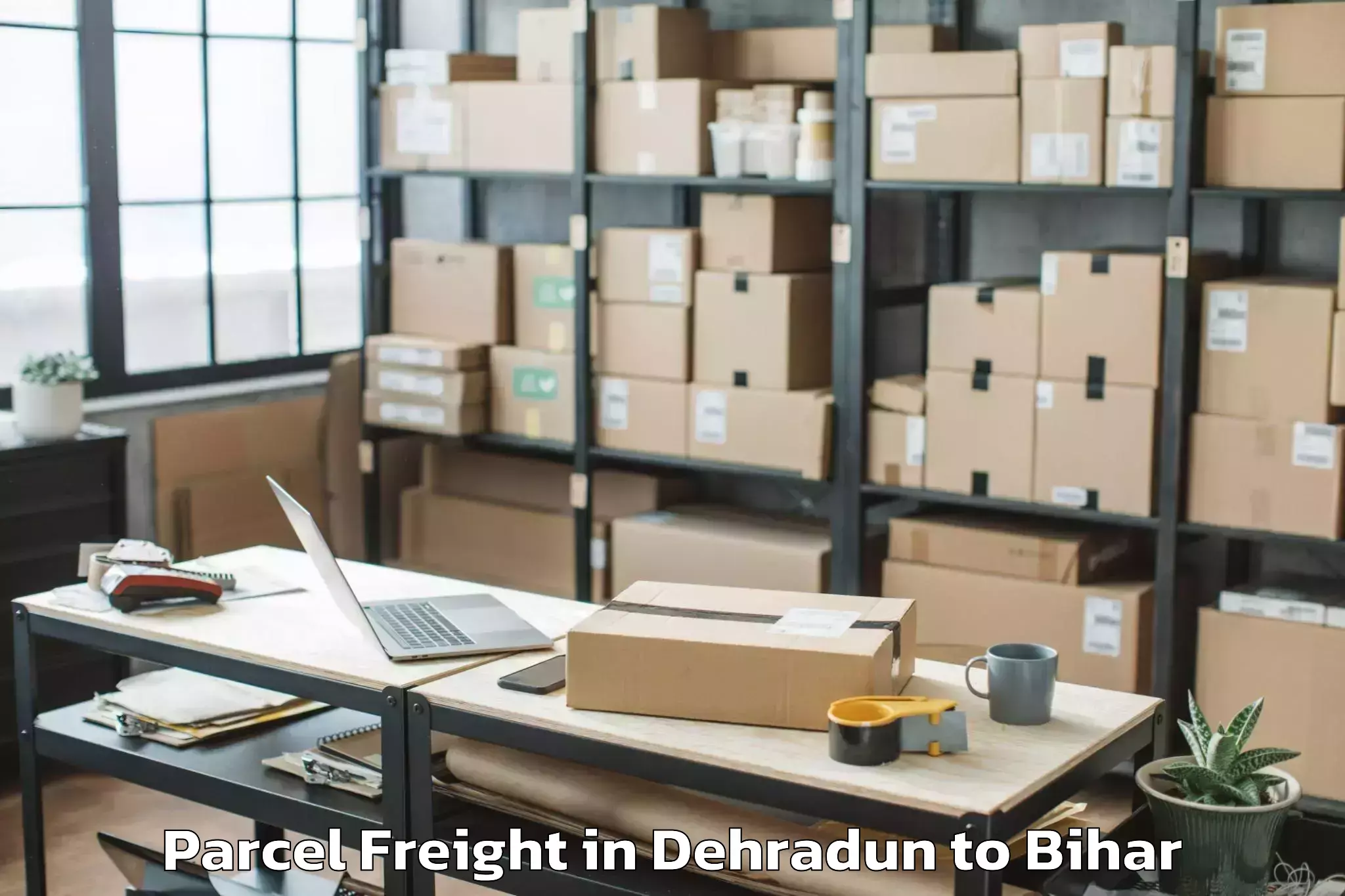 Book Dehradun to Singhia Parcel Freight Online